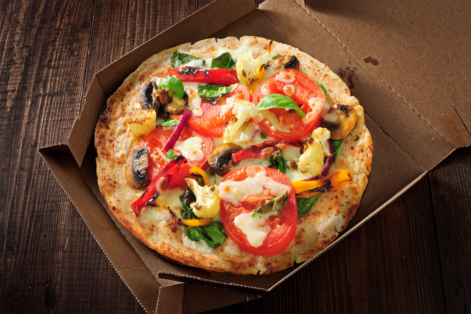 cauliflower crust pizza in box